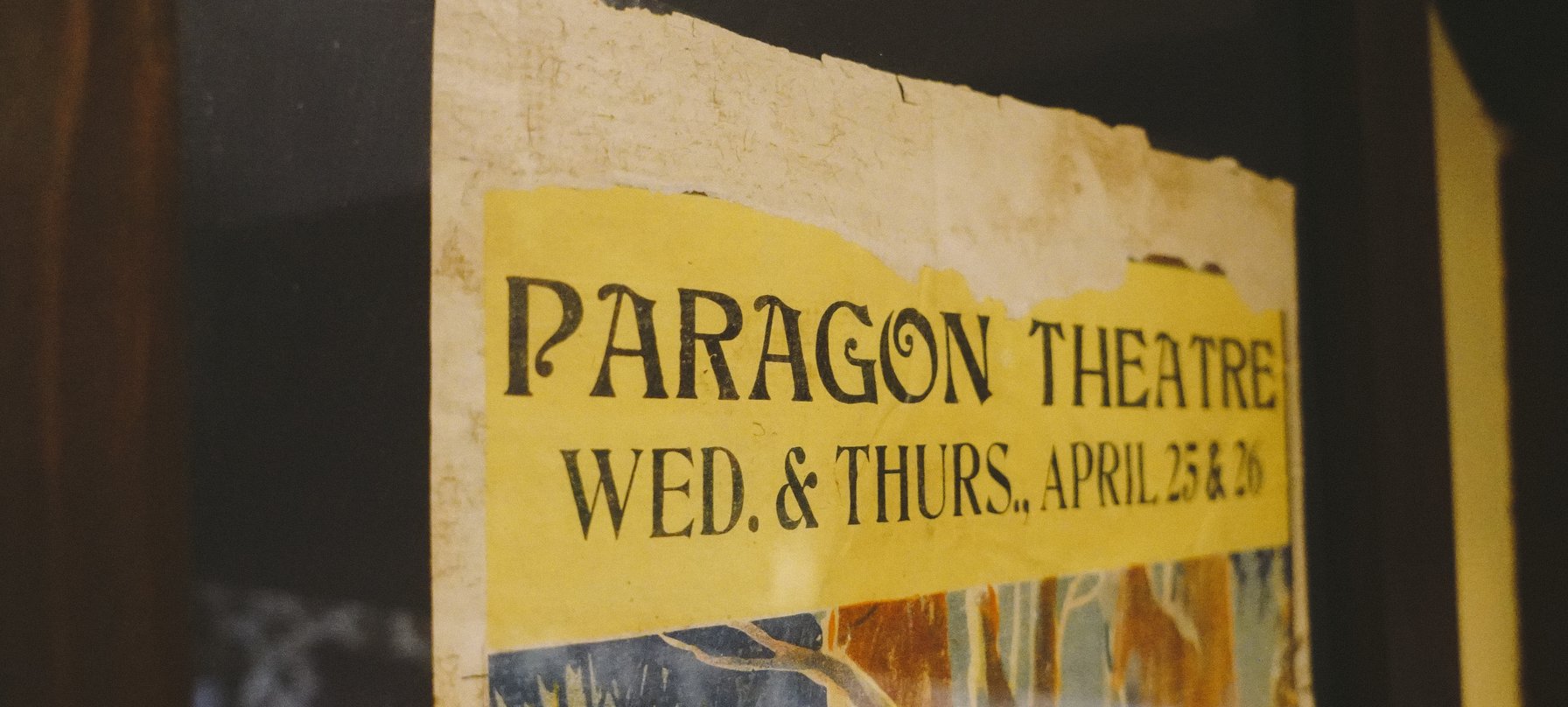 A photo of a Paragon Theatre poster on a window, credit Ollie Khedun and West Coast Council.