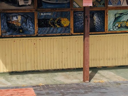Hayley Strutt seated in the Queenstown mall (cred. Eli Strutt) copy