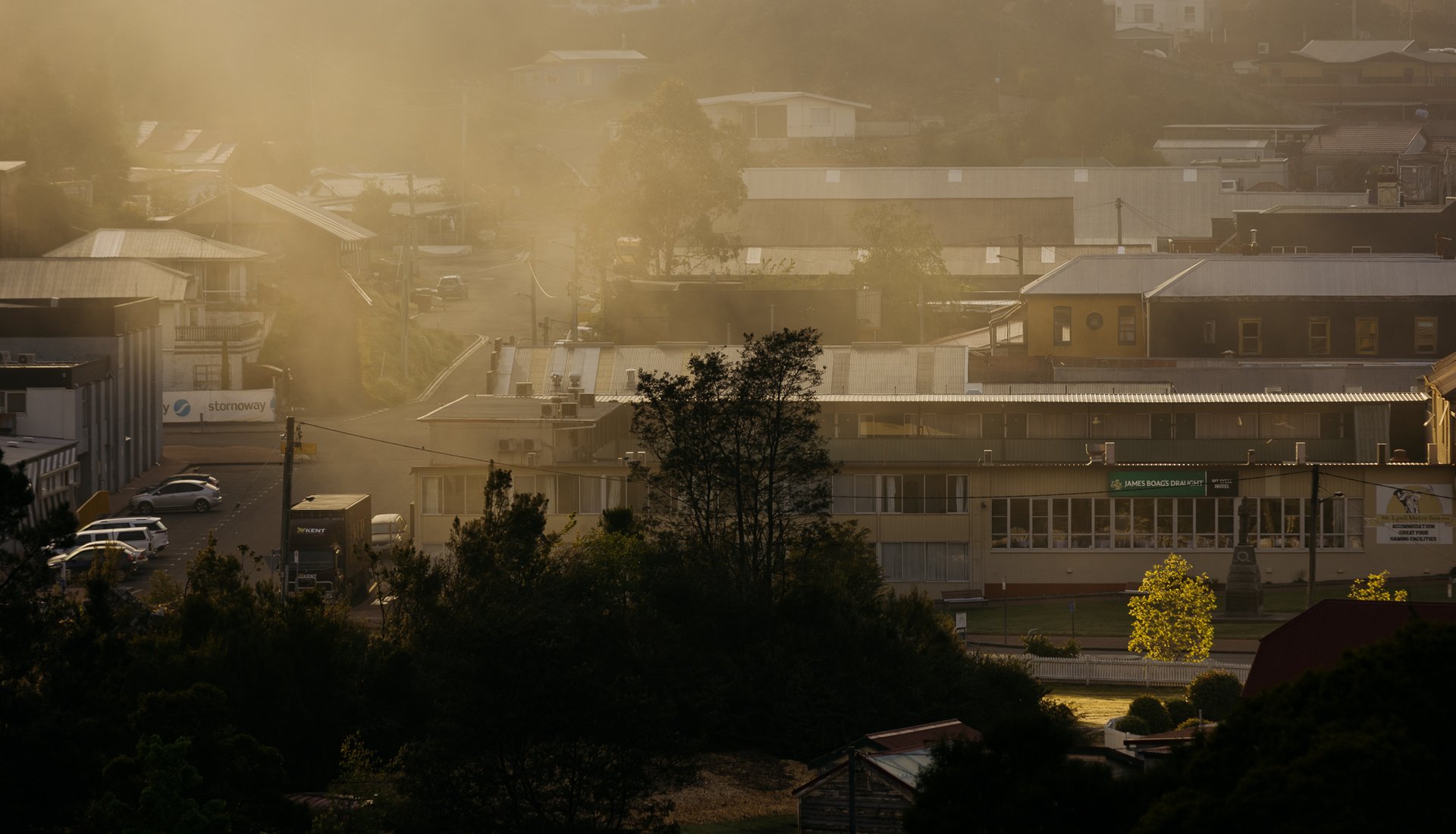 A photo of Queenstown rooftops on a misty day by Jesse Hunniford