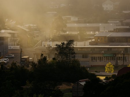 A photo of Queenstown rooftops on a misty day by Jesse Hunniford