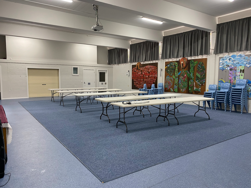 A photo inside the gallery at St Joseph&#x27;s Catholic School. The carpet is different shades of blue.