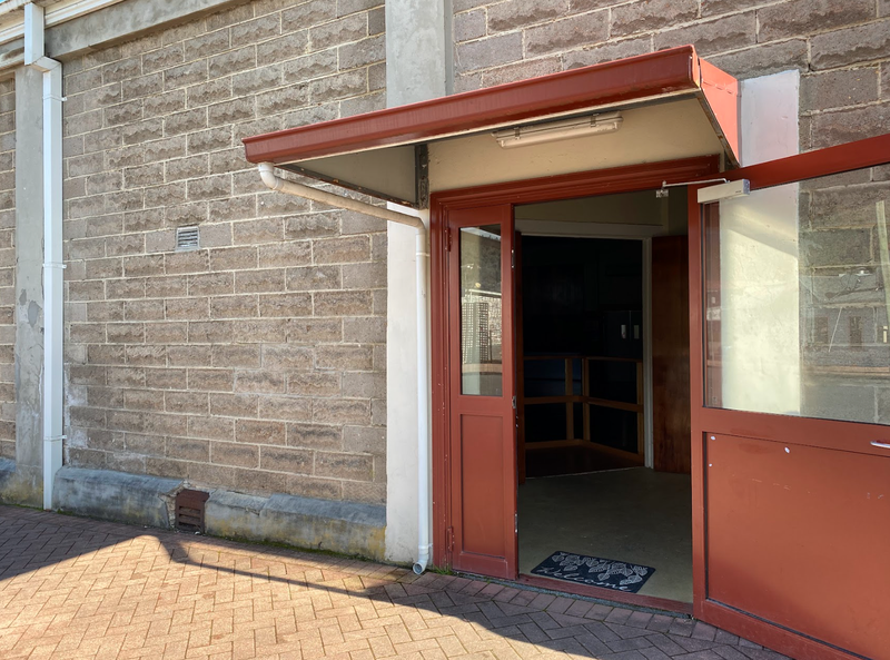 A photo of the side level-access entrance into Queenstown Memorial Hall.