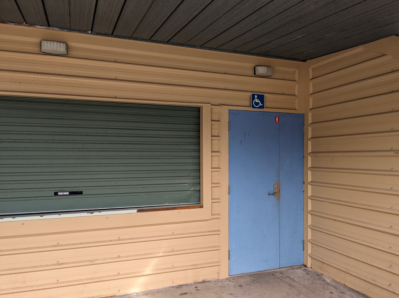 A photo of the doorway leading to the accessible bathroom at Queenstown Football Ground.