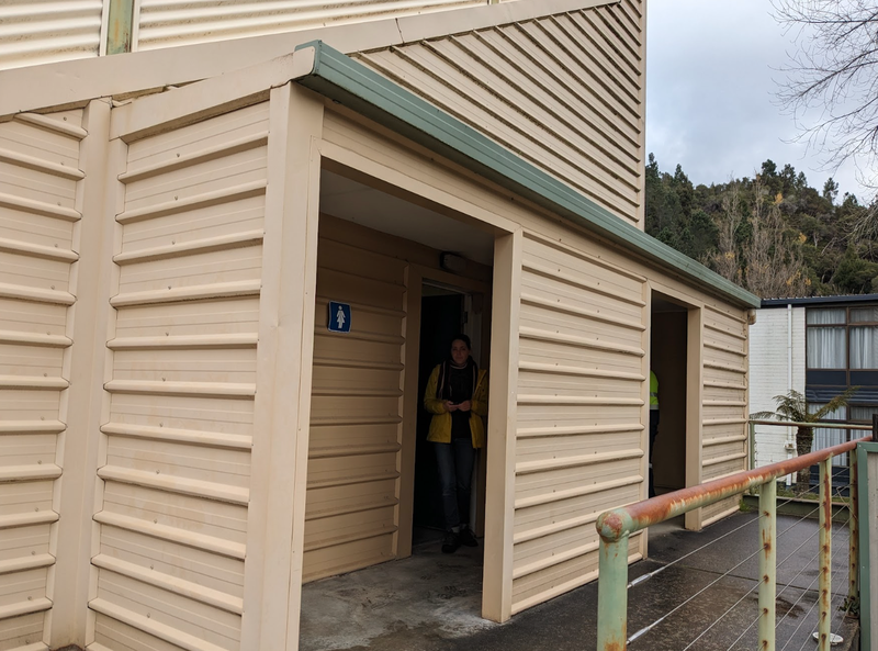 A photo of the entrance to gendered bathrooms at Queenstown Football Ground.