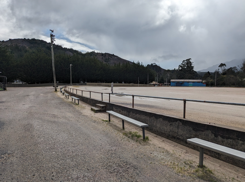 A photo of oval-side bench seating available at Queenstown Football Ground.