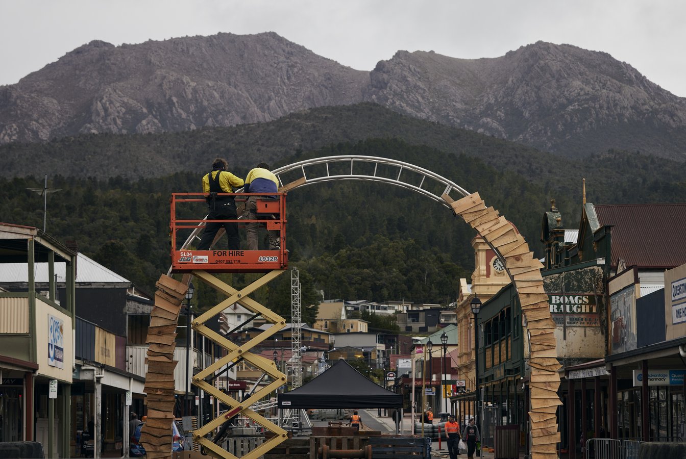 Two workers in high visibility clothing constructing the archway entrance to Crib Road.